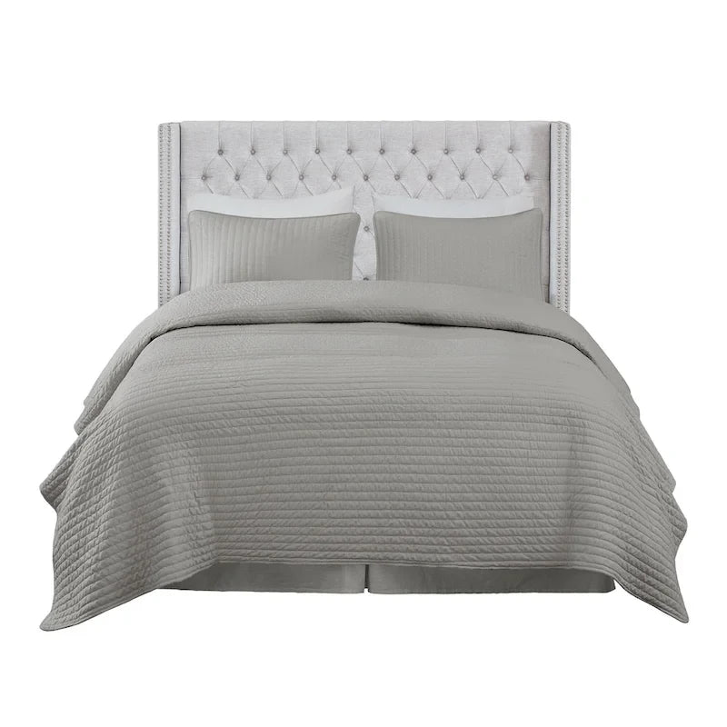Tête de lit capitonnée à oreilles avec boutons touffetés et clous décoratifs