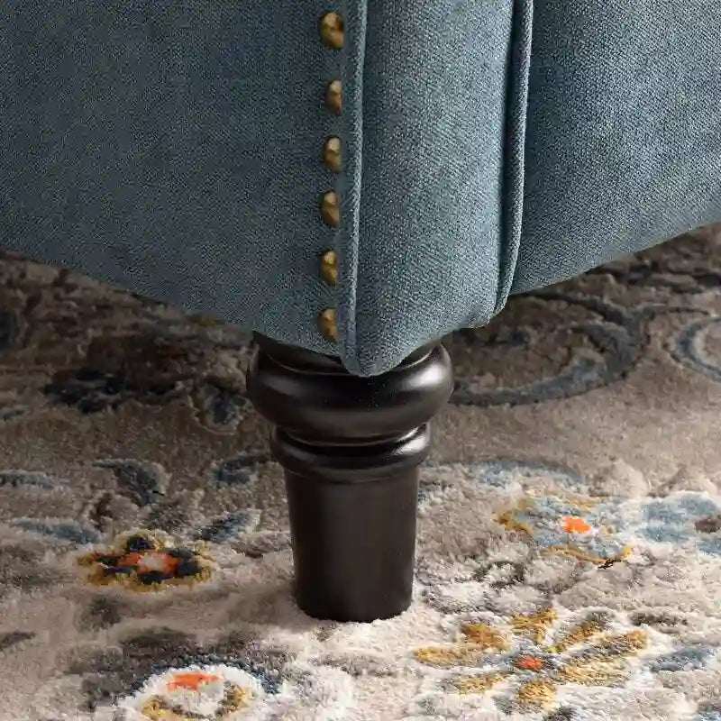 Fauteuil inclinable à dossier capitonné et pieds en bois